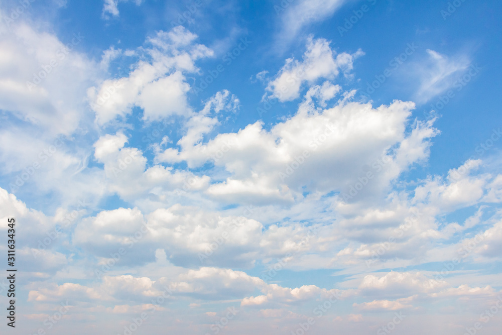 White clouds in the blue sky. Background. Texture White clouds in the blue sky. Background. Texture