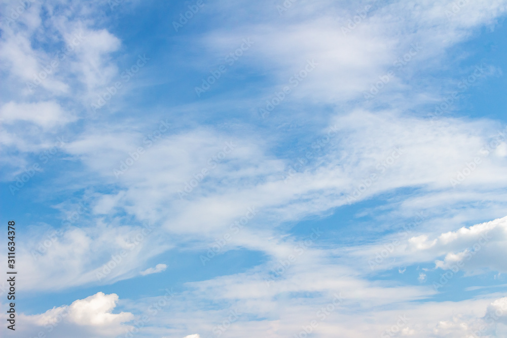 White clouds in the blue sky. Background. Texture White clouds in the blue sky. Background. Texture