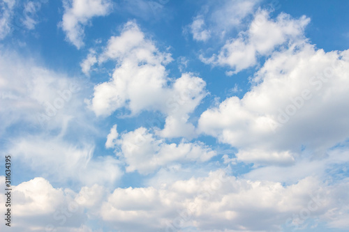 White clouds in the blue sky. Background. Texture