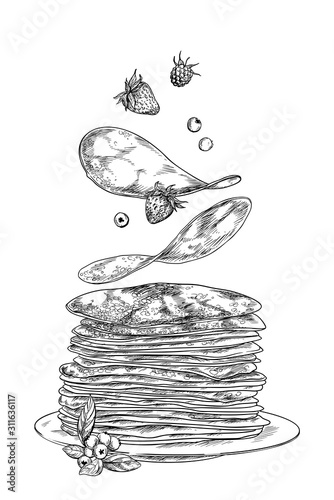 Pancakes and berries falling on the stack 
