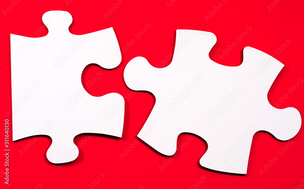 Two puzzles on a red background. Two puzzles on a red background Two puzzles on a red background. Two puzzles on a red background