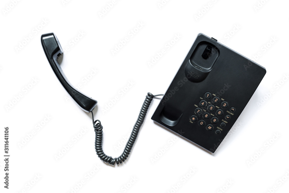 Simple modern push-button telephone of black color with a picked up handset isolated on a white background Simple modern push-button telephone of black color with a picked up handset isolated on a white background