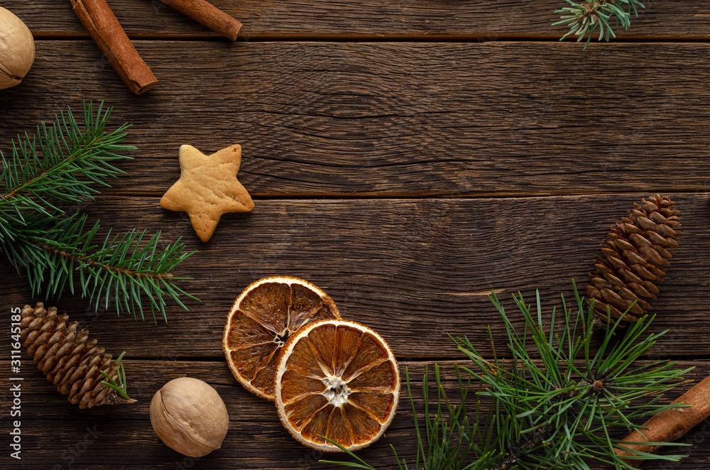 Christmas decoration with fir tree branches on wooden background, copy space Christmas decoration with fir tree branches on wooden background, copy space