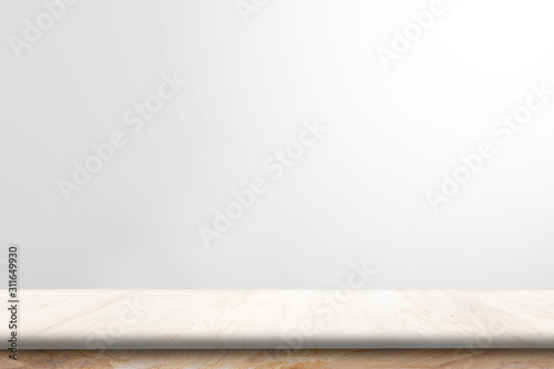Wooden table in front of abstract blurred and empty room background perspective over wooden used for display or montage your products