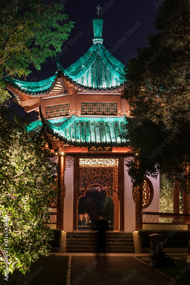 Fototapeta premium Night view of Chinese Pavillion with light decoration at East Lake, Wuhan Hubei / China.
