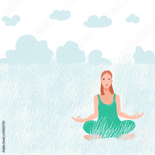 Young pretty woman sitting on nature and performing yoga exercise.