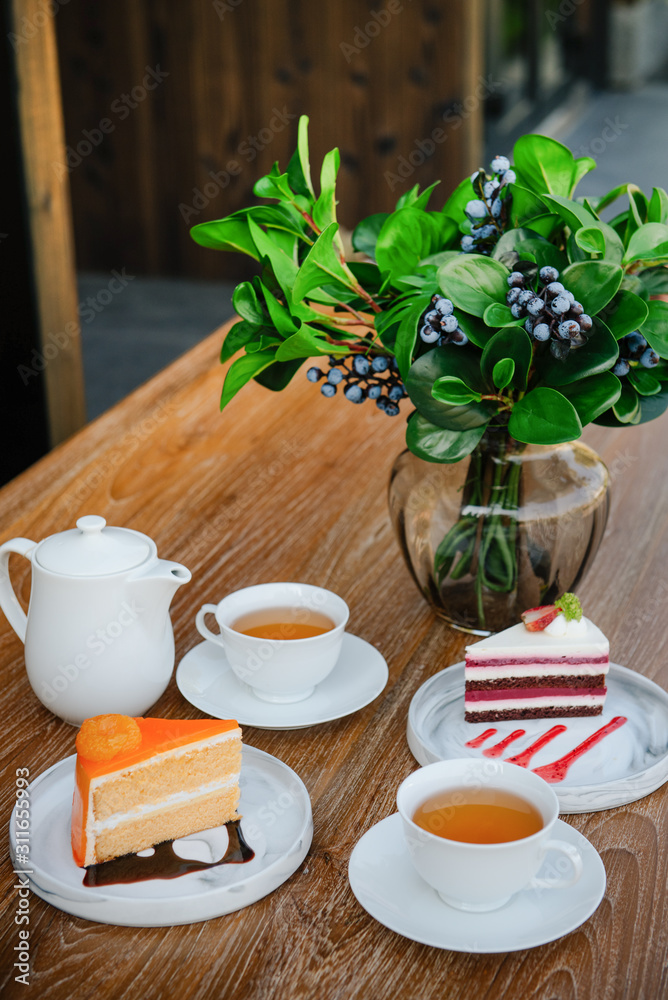 Hot tea in the morning with cakes Hot tea in the morning with cakes