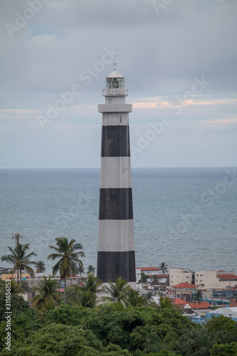 Lighthouse on coast of sea, Olinda, Pernambuco, Brazil, South America