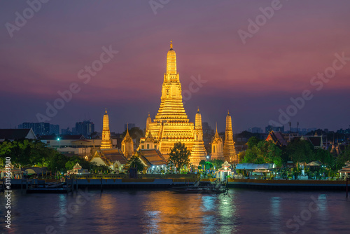 twilight night Thai temple named  Wat Arun  Buddhist Temple  a beautiful famous pagoda place. tourists and tour guides from around the world to visit. Bangkok city  Thailand  Asia. 