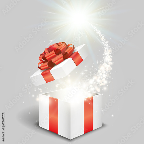 Open gift box and magical light