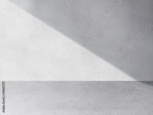 an empty concrete wall room with gray floor