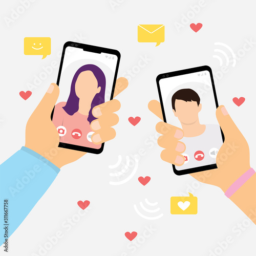 Female hand holding smartphone with boyfriend on screen.Video call concept. Video call with loved one.
