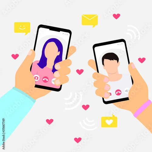 Female hand holding smartphone with boyfriend on screen.Video call concept. Video call with loved one.