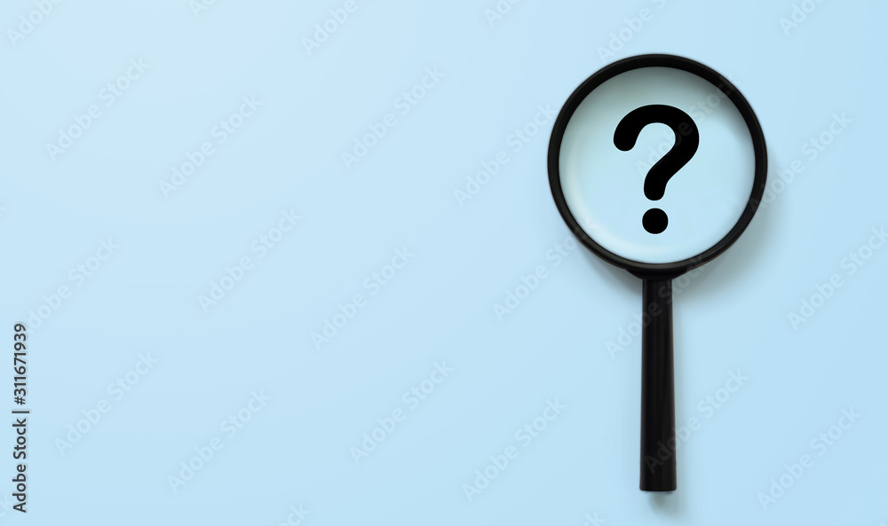 Magnifying glass with question mark symbol. Concept creative idea and innovation Magnifying glass with question mark symbol. Concept creative idea and innovation