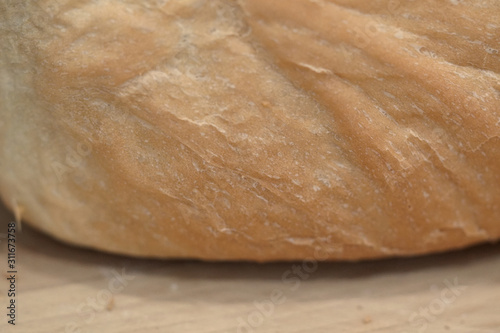 The homemade fresh baked bread loaf.