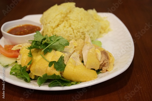 The chicken rice with potatoes and vegetables.