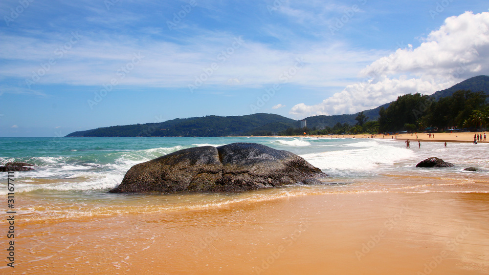 Fototapeta premium Tropical beach, boulders on the beach, Karon beach, Phuket, Thailand