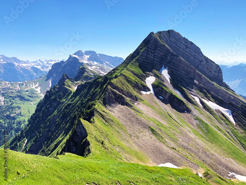 Zindlenspitz Mountain above the valley Wagital or Waegital and alpine Lake Wagitalersee (Waegitalersee), Innerthal - Canton of Schwyz, Switzerland photo