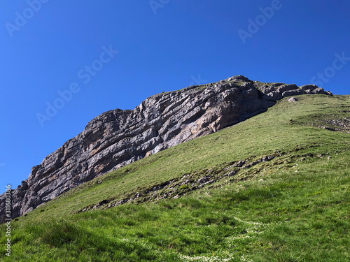 Zindlenspitz Mountain above the valley Wagital or Waegital and alpine Lake Wagitalersee (Waegitalersee), Innerthal - Canton of Schwyz, Switzerland photo