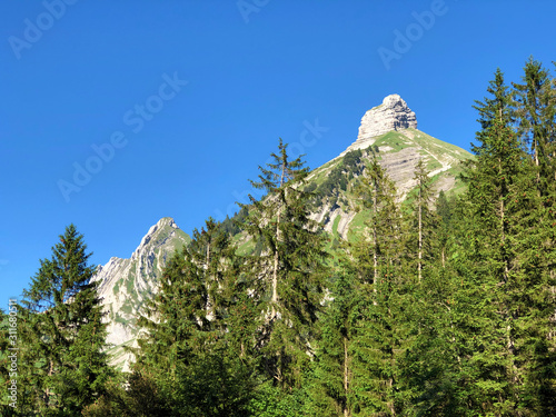 Zindlenspitz Mountain above the valley Wagital or Waegital and alpine Lake Wagitalersee (Waegitalersee), Innerthal - Canton of Schwyz, Switzerland photo