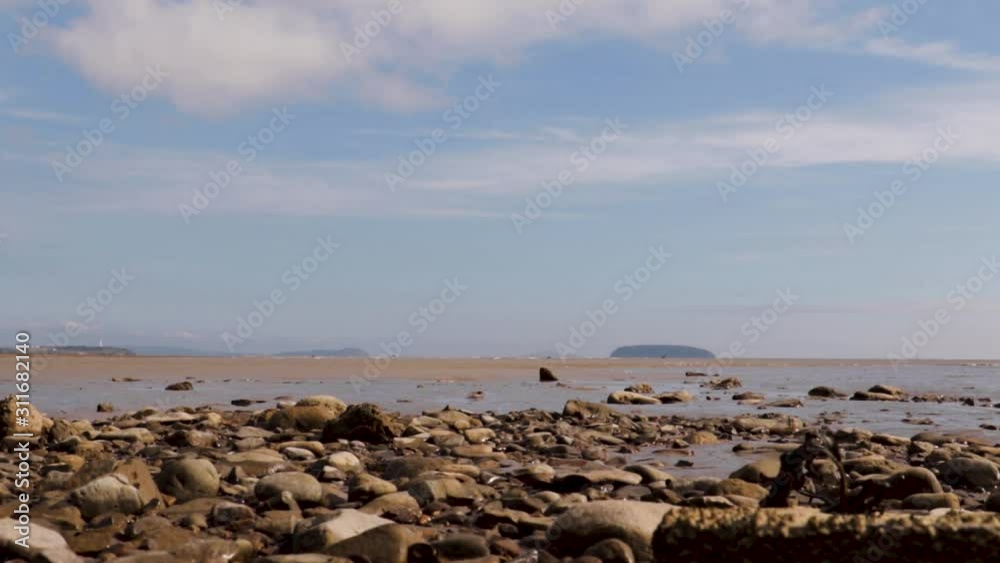 Time lapse of Sully beach, looking out across sea to Flath Holm Island. Time lapse of Sully beach, looking out across sea to Flath Holm Island.