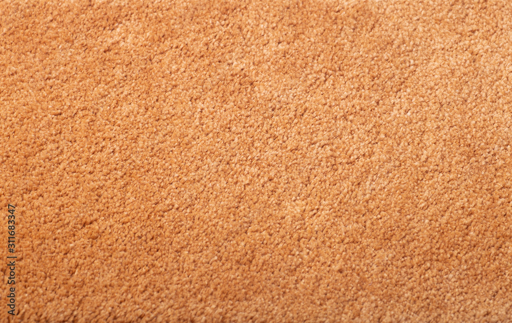 Carpet covering background. Pattern and texture of peach colour carpet. Copy space. Carpet covering background. Pattern and texture of peach colour carpet. Copy space.