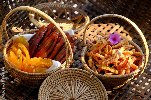 Vietnamese traditional food tet holiday  fruit and vegetables sweet jam from carrot  kumquat  banana  water chestnut