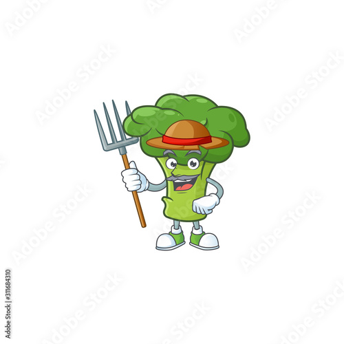 Happy Farmer green broccoli cartoon mascot with hat and tools