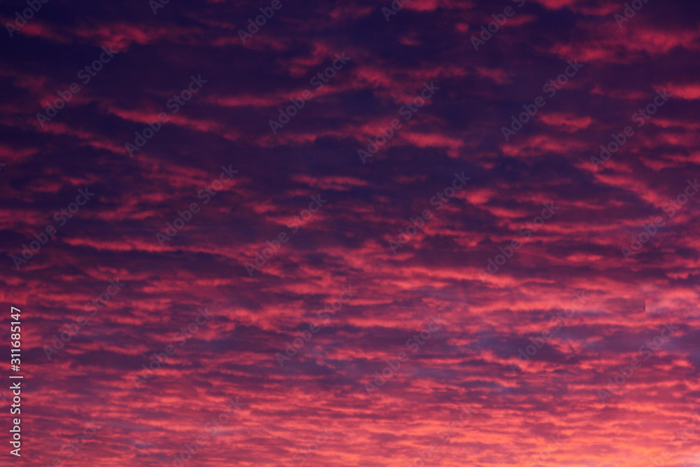 unusual color of clouds at dawn