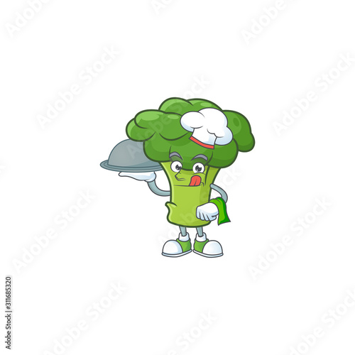 Cute green broccoli as a Chef with hat and tray cartoon style design