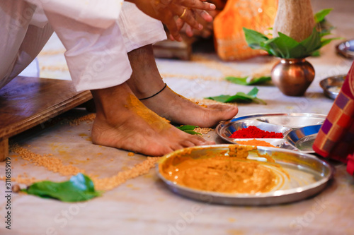 Indian Traditional Wedding: Turmeric powder in plate  for haldi ceremony  photo