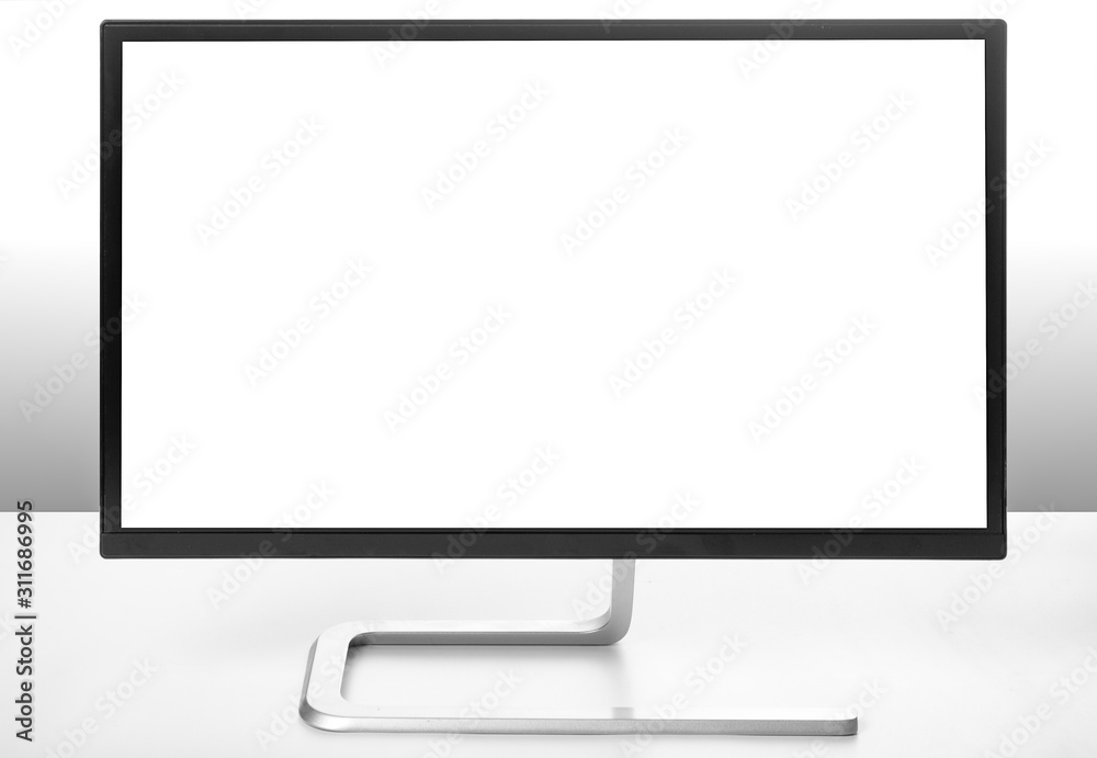 Modern monitor on white table and light background. Modern monitor on white table and light background.