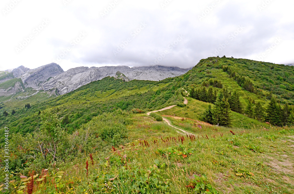 Obraz premium Beautiful mountain landscape in French Alps. Hike on passes Annes and Oulettaz