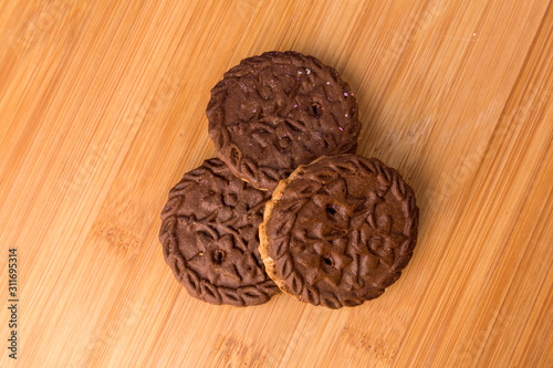 Several tasty hispanic sandwich snack cookies stacked together