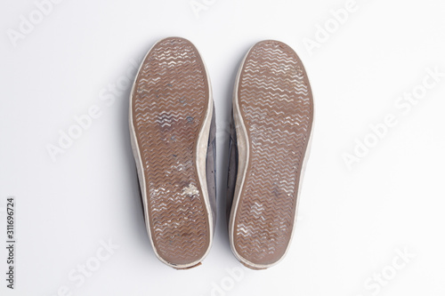 old dirty sole sneakers isolated