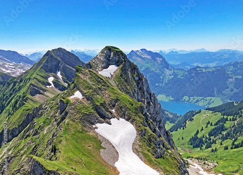 Rossalpelispitz or Rossaelplispitz and Zindlenspitz Mountains above the alpine Lake Wagitalersee (Waegitalersee), Innerthal - Canton of Schwyz, Switzerland photo