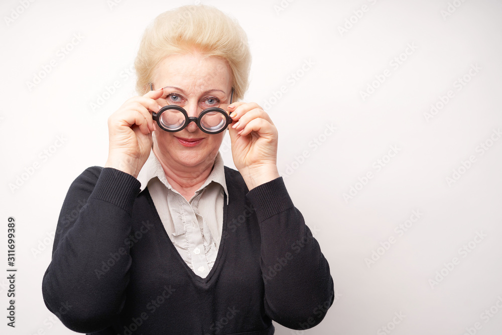 happy grandmother with glasses on a white background