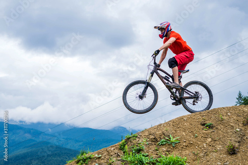Professional athlete ride on a mountain bike.