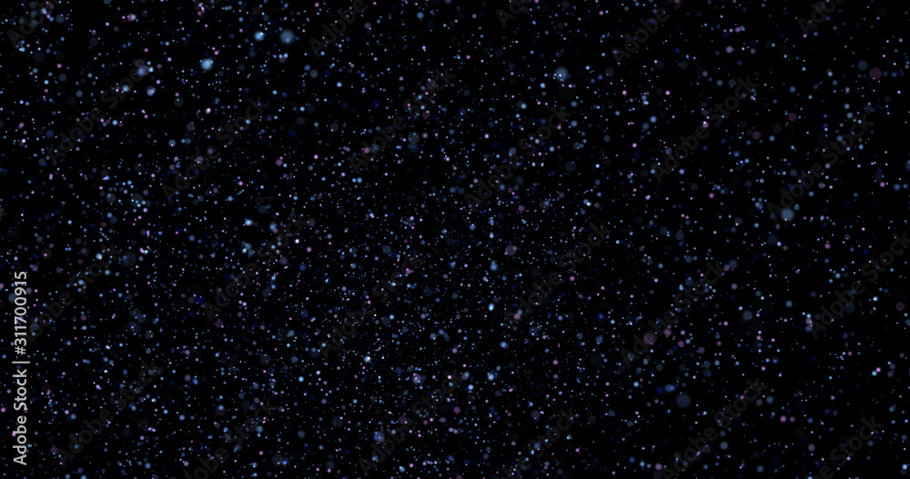 Obraz premium Flying dust particles on a black background
