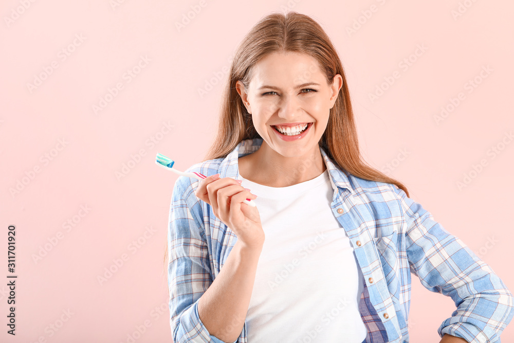 Young woman with toothbrush on color background Young woman with toothbrush on color background