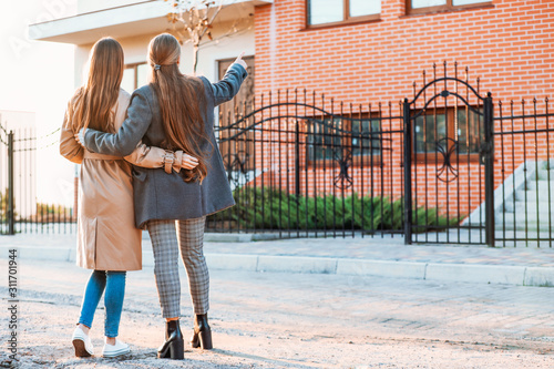 Young lesbian couple near t...