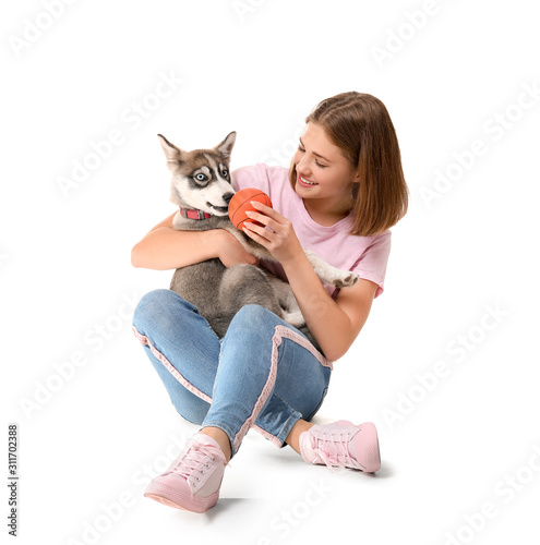 Cute teenage girl playing w...