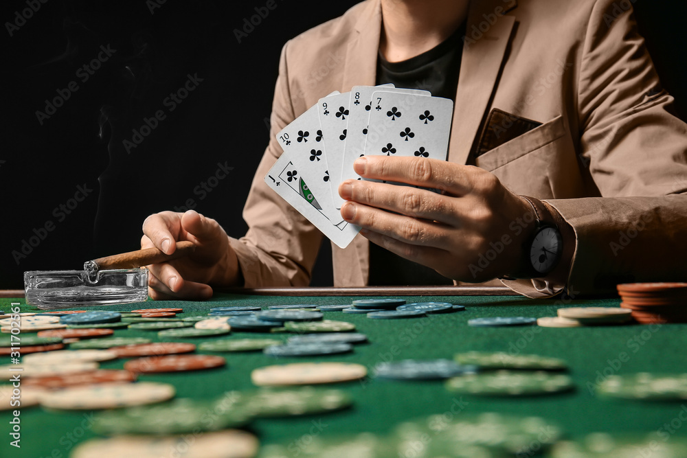 Young man playing in casino, closeup Young man playing in casino, closeup
