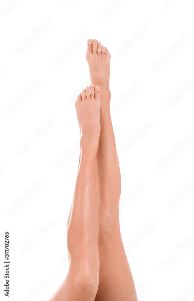 Legs of beautiful young woman on white background Legs of beautiful young woman on white background