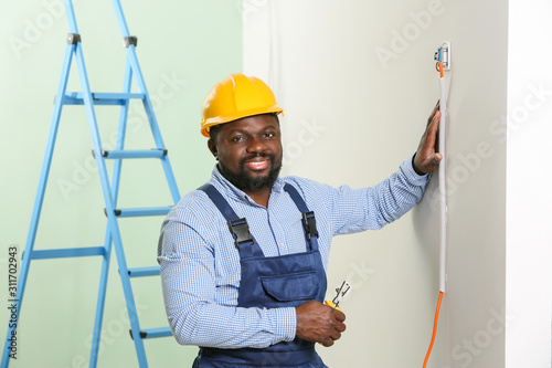 African-American electricia...