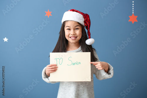 Cute little girl with lette...