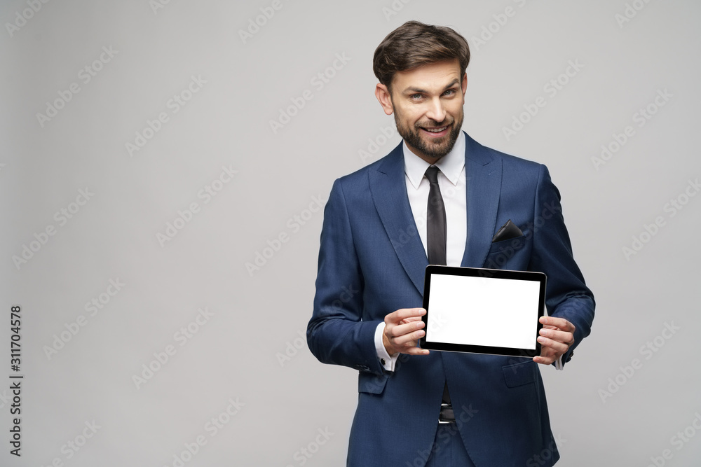 Young Businessman presenting digital tablet pc pad with blank screen Young Businessman presenting digital tablet pc pad with blank screen