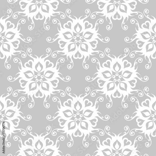 Monochrome seamless pattern. White flowers on gray background