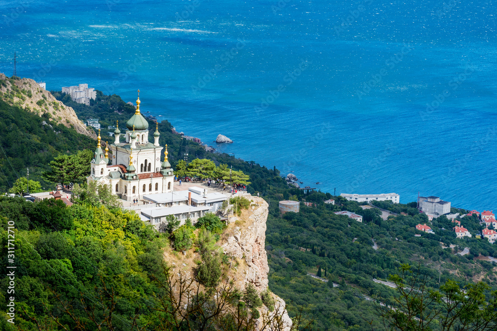 Popular scenic Church of Christ Resurrection on Red Cliff above Black Sea coastline near Foros, Crimea
