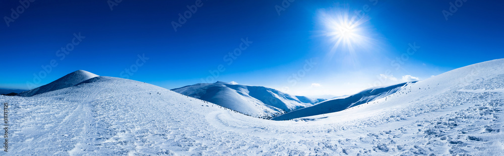 Panoramic view of mountains covered with snow